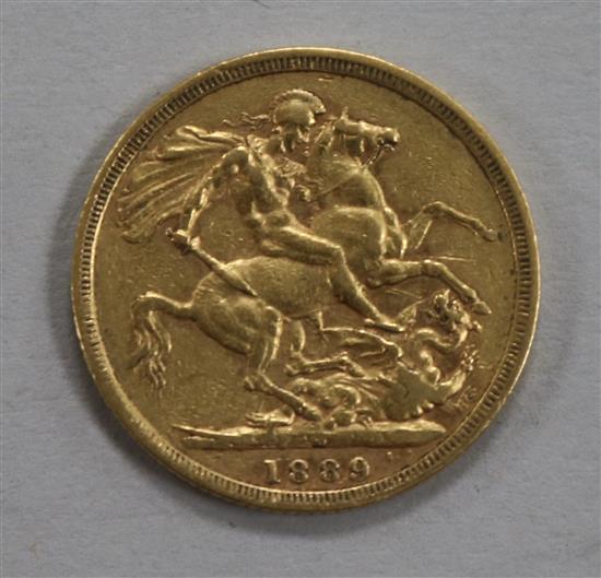 An 1889 gold full sovereign.